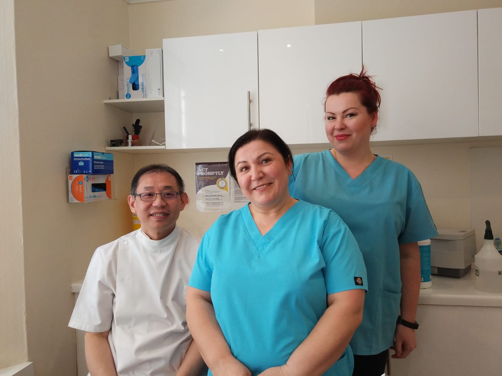 Dr Fang with dental nurses